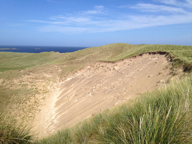 Grassed sand dunes next to the Machair