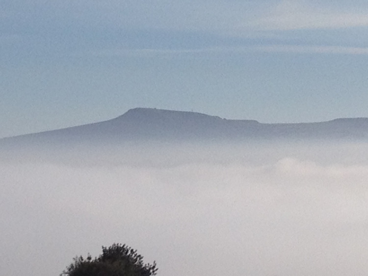 Titterstone Clee emerging from the fog