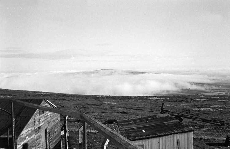 View from the primary radar in 1968 across to Brown Clee rising above the fog