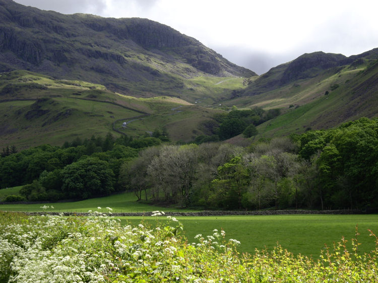 Cars on the winding road up to Hardknott Pass