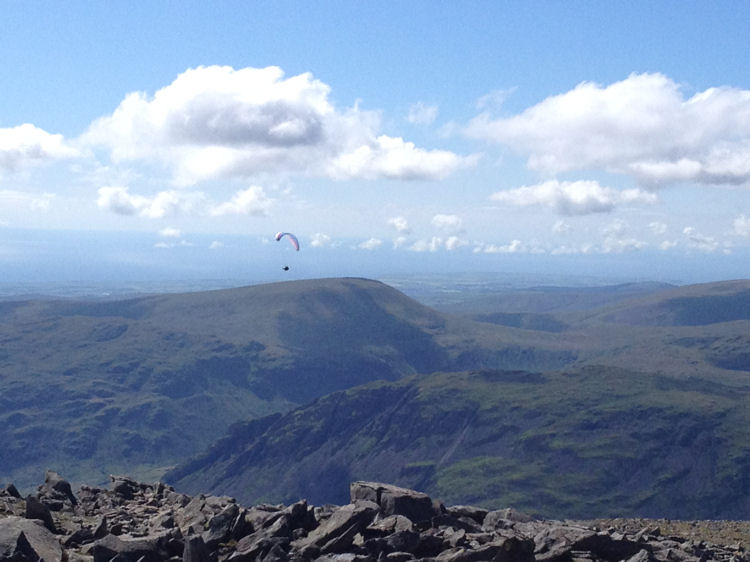One of two paragliders taking in the scenery