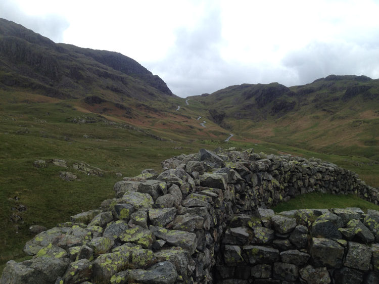 Looking up at the road to Hardknott Pass from Hardknott Roman Fort