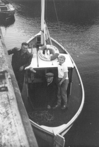 'Constancy' BCK225 is visited by uncle William Watson Cheyne and nephew Fraser Moray Lanchester c1968