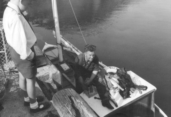 Neil Alexander Pirie looks down  on his uncle William aboard 'Constancy' BCK225 c1968