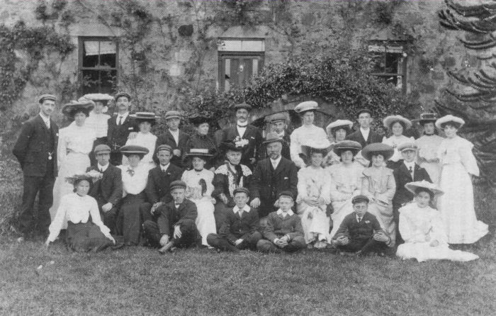 William Cheyne, staff and friends in front of Cortes House William Cheyne, staff and friends in front of Cortes House